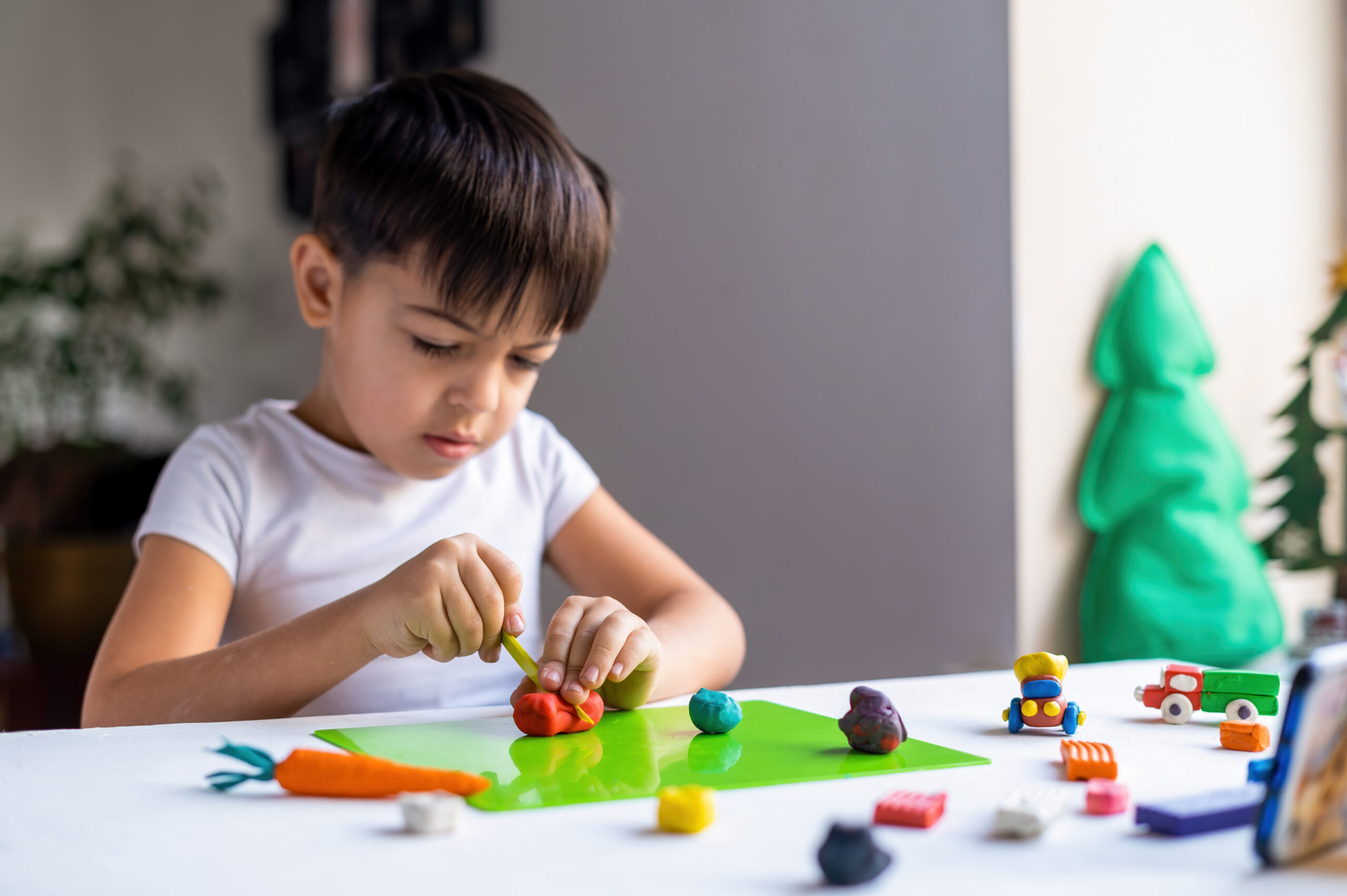 boys play with clay.