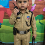 kid in Delhi police costume